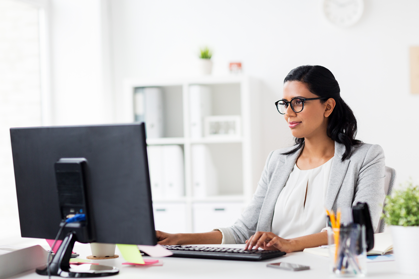 Business automation woman white and gray on computer